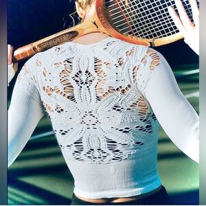 NWOT $78 FP Movement Happiness Runs Floral Long Sleeve Top